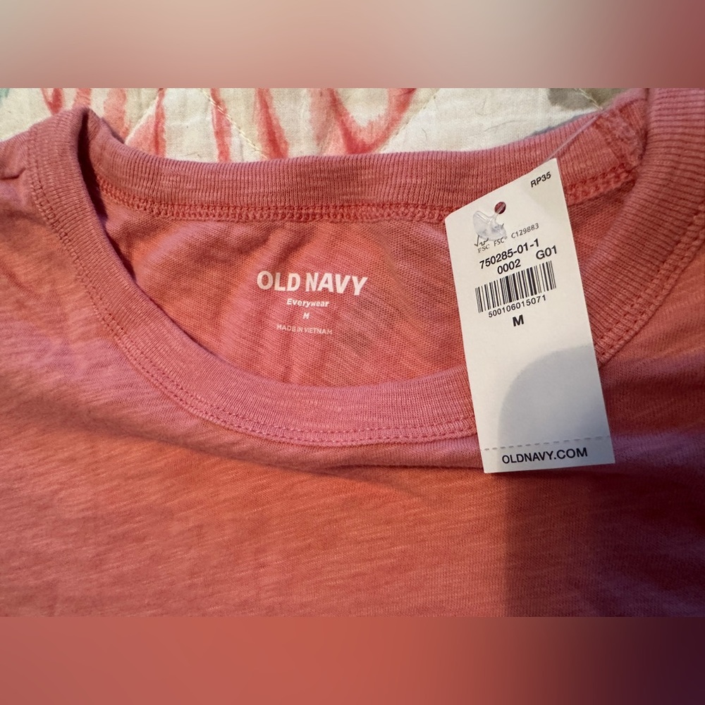Women’s heather pink long sleeve tee